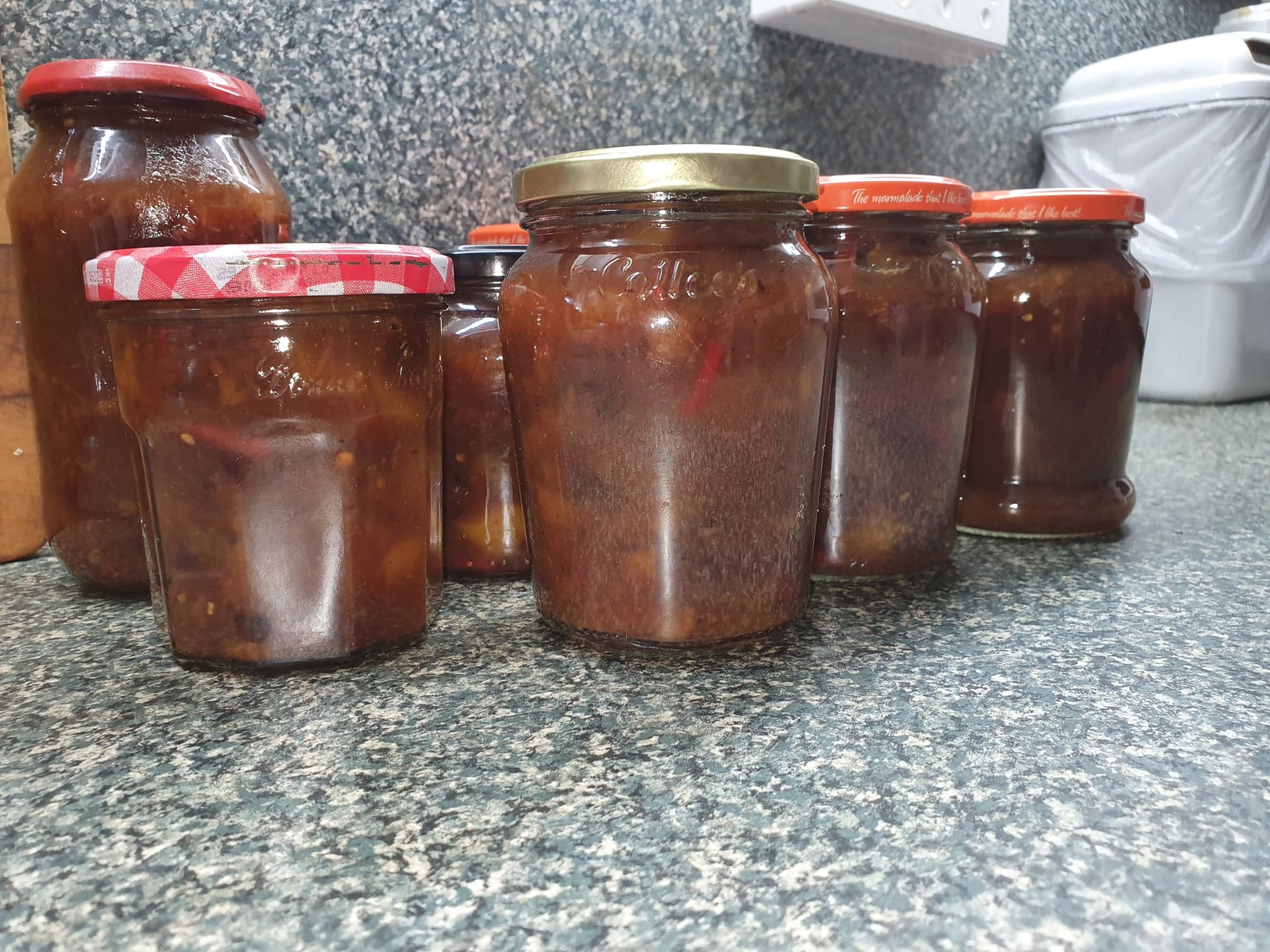 Three jars of finished mango chutney